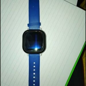 Sleek Blue Smartwatch with Modern Design and Adjustable Strap